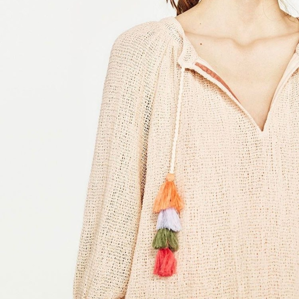 Summery top with rainbow tassels